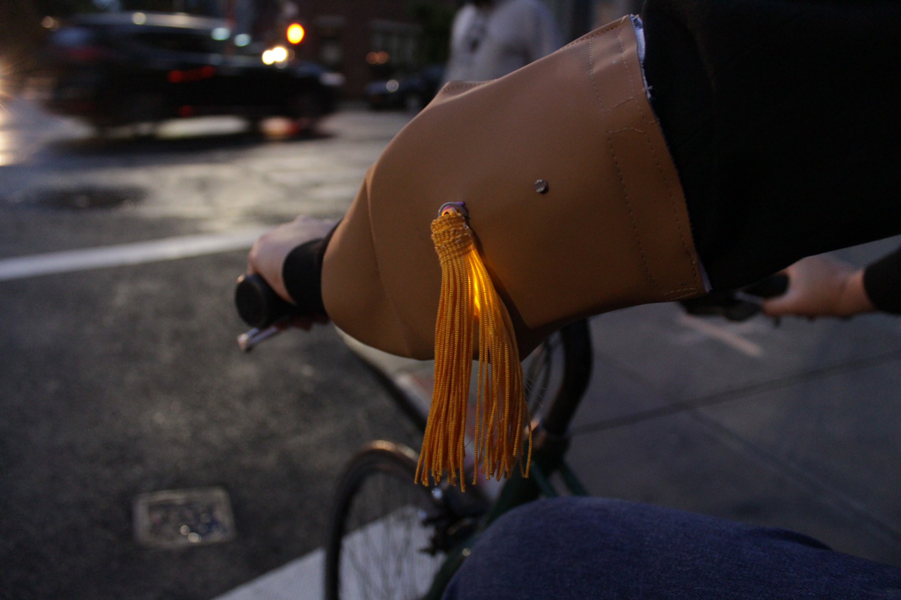 Photo of the wearable device being used. The fringe is light up as response to the sunset.